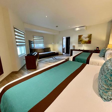 ออเรีย โฮเต็ล แอนด์ สวีท Hotel ซาโปปัน ภายนอก รูปภาพ
