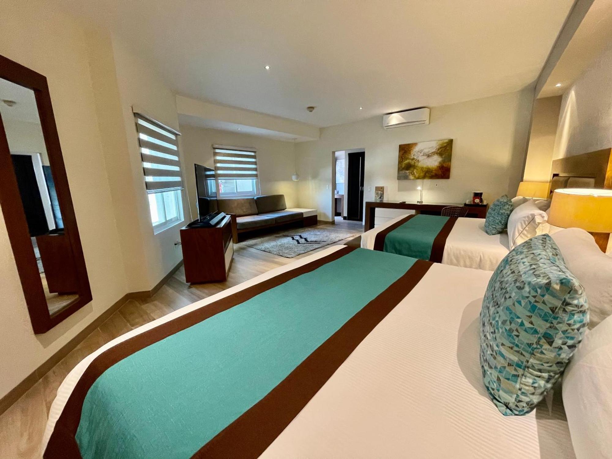 ออเรีย โฮเต็ล แอนด์ สวีท Hotel ซาโปปัน ภายนอก รูปภาพ