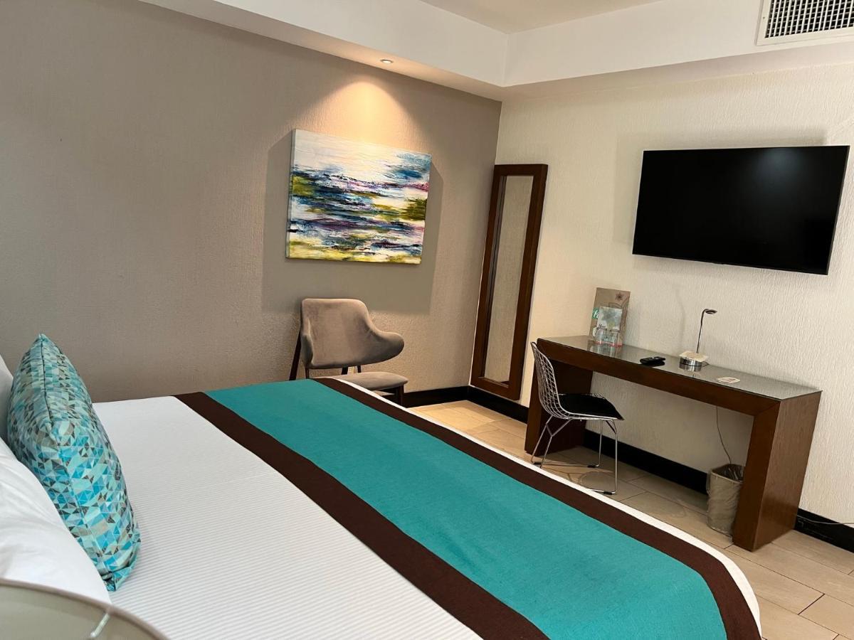 ออเรีย โฮเต็ล แอนด์ สวีท Hotel ซาโปปัน ภายนอก รูปภาพ