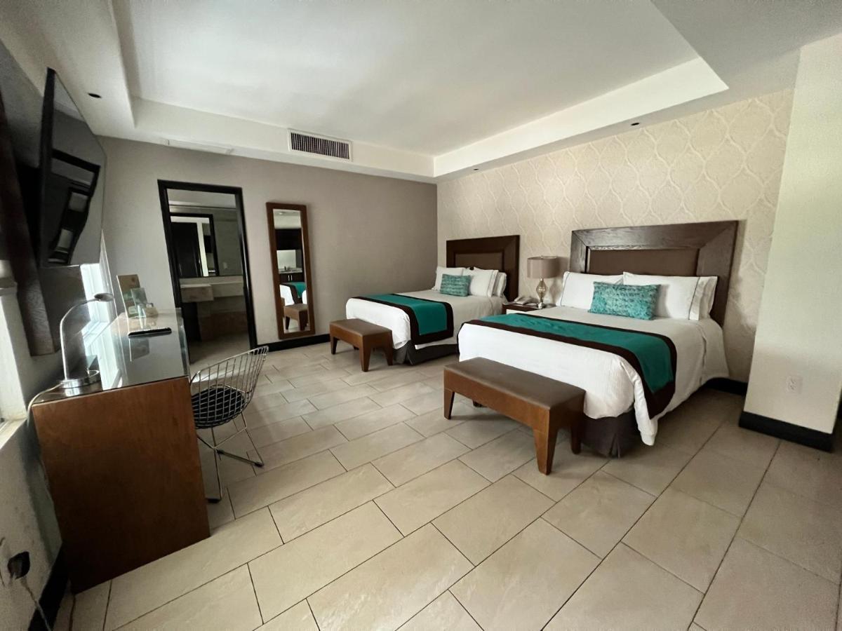 ออเรีย โฮเต็ล แอนด์ สวีท Hotel ซาโปปัน ภายนอก รูปภาพ